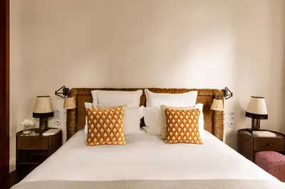Un ou plusieurs lits dans un hébergement de l'établissement Château des Fleurs Hôtel & Spa Paris