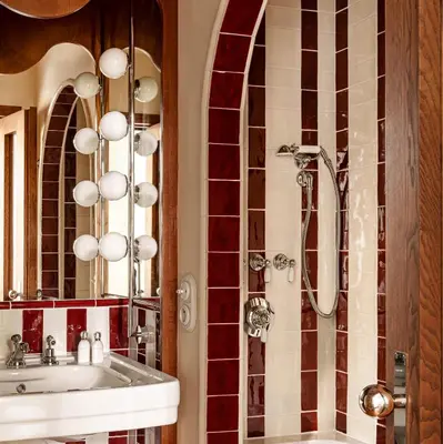 Salle de bains dans l'établissement Château des Fleurs Hôtel & Spa Paris