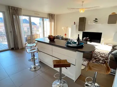 Télévision ou salle de divertissement dans l'établissement le Penthouse Picquart