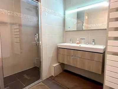 Salle de bains dans l'établissement le Penthouse Picquart