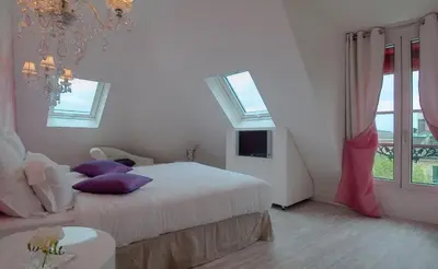 Un ou plusieurs lits dans un hébergement de l'établissement Hotel Cluny Square