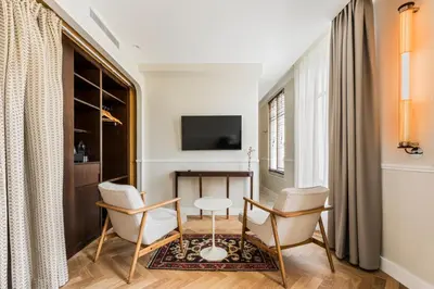Télévision ou salle de divertissement dans l'établissement Hôtel Chamar