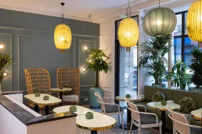 Coin salon dans l'établissement Hôtel Le Lavoisier & Spa