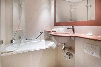 Salle de bains dans l'établissement Hôtel Paris Louvre Opéra