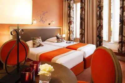 Un ou plusieurs lits dans un hébergement de l'établissement Hotel Residence Foch