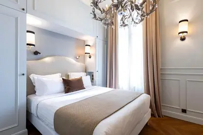 Un ou plusieurs lits dans un hébergement de l'établissement Hotel Residence Foch