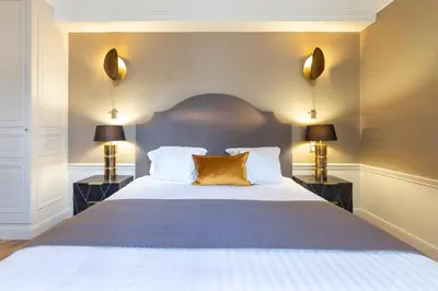 Un ou plusieurs lits dans un hébergement de l'établissement Hotel Residence Foch