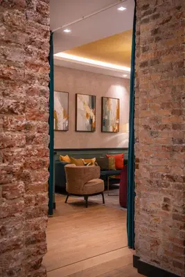 Coin salon dans l'établissement Hôtel Brittany