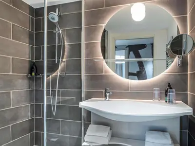 Salle de bains dans l'établissement Aparthotel Adagio Paris Nation