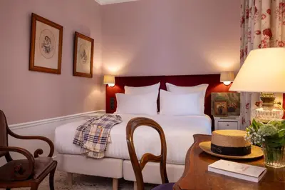Un ou plusieurs lits dans un hébergement de l'établissement Hôtel Le Saint Gregoire