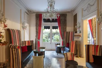 Coin salon dans l'établissement Hôtel Regent's Garden - Astotel