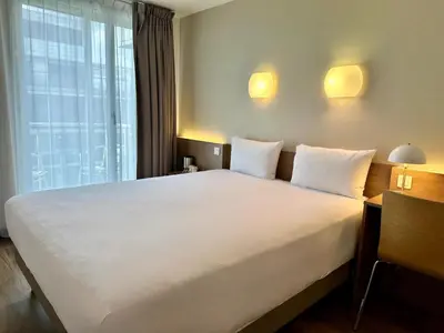 Un ou plusieurs lits dans un hébergement de l'établissement CAMPANILE PARIS 12 - Bercy Village