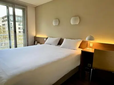 Un ou plusieurs lits dans un hébergement de l'établissement CAMPANILE PARIS 12 - Bercy Village