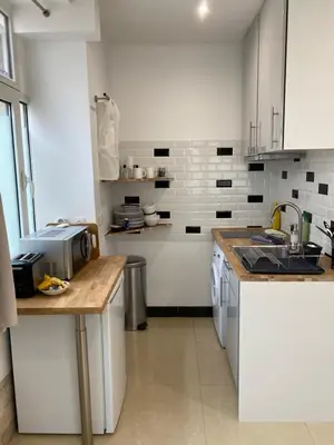 Cuisine ou kitchenette dans l'établissement Large and unique souplex 60sqm, well located