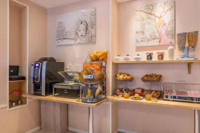 Cuisine ou kitchenette dans l'établissement L'Ouest Hotel