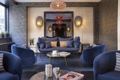Coin salon dans l'établissement Hôtel Elysées Régencia