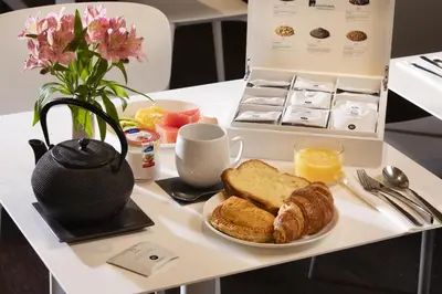 Options de petit-déjeuner proposées aux clients de l'établissement Hôtel Elysées Régencia