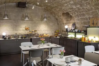 Restaurant ou autre lieu de restauration dans l'établissement Hôtel Elysées Régencia