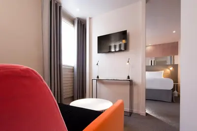 Un ou plusieurs lits dans un hébergement de l'établissement Hotel Duette Paris
