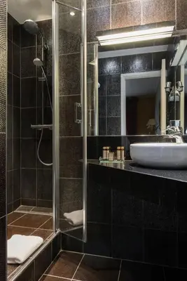 Salle de bains dans l'établissement Neuilly Park Hotel