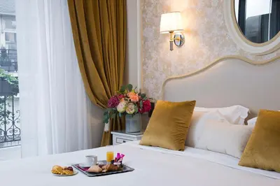 Un ou plusieurs lits dans un hébergement de l'établissement Hôtel Saint-Pétersbourg Opéra & Spa