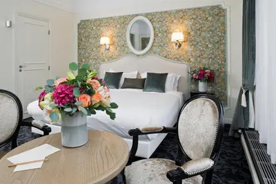Un ou plusieurs lits dans un hébergement de l'établissement Hôtel Saint-Pétersbourg Opéra & Spa