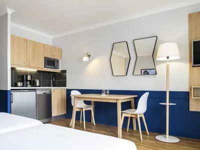 Cuisine ou kitchenette dans l'établissement Aparthotel Adagio La Défense Kléber