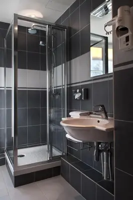 Salle de bains dans l'établissement Hôtel de la Motte Picquet