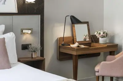Un ou plusieurs lits dans un hébergement de l'établissement Best Western Plus La Demeure