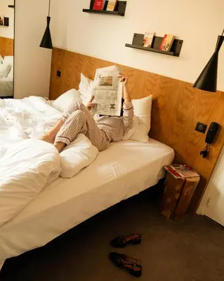 Un ou plusieurs lits dans un hébergement de l'établissement 9Hotel Bastille-Lyon