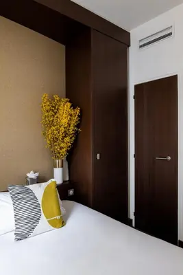 Un ou plusieurs lits dans un hébergement de l'établissement Hôtel Le Colisée