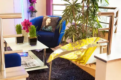 Coin salon dans l'établissement Le Hameau de Passy