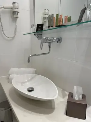 Salle de bains dans l'établissement Le Pergolèse Paris Champs Elysées