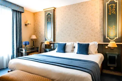 Un ou plusieurs lits dans un hébergement de l'établissement Villa Beaumarchais