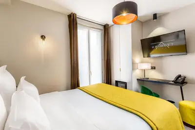 Un ou plusieurs lits dans un hébergement de l'établissement Hotel Bridget