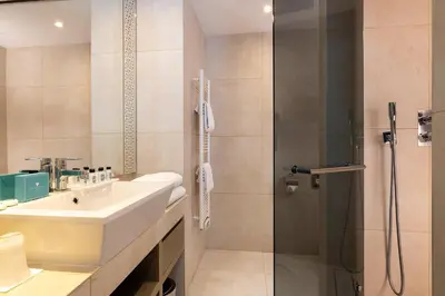 Salle de bains dans l'établissement Hôtel Etoile Maillot