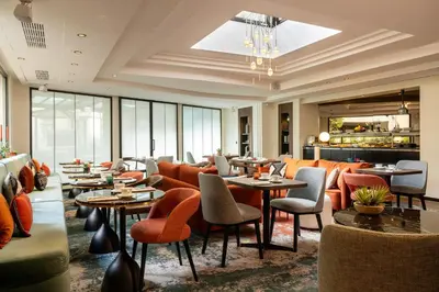 Coin salon dans l'établissement Hôtel Etoile Maillot