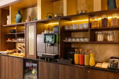 Cuisine ou kitchenette dans l'établissement Hôtel Etoile Maillot