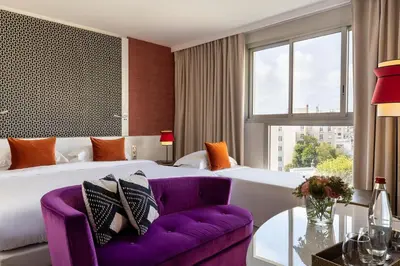 Coin salon dans l'établissement Hôtel Etoile Maillot