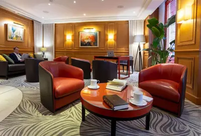 Coin salon dans l'établissement Hotel Etats Unis Opera