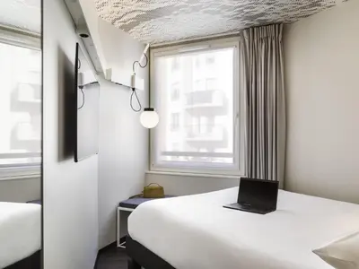 Un ou plusieurs lits dans un hébergement de l'établissement ibis Paris Nation Davout
