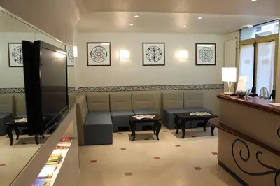 Coin salon dans l'établissement Kyriad Hotel XIII Italie Gobelins