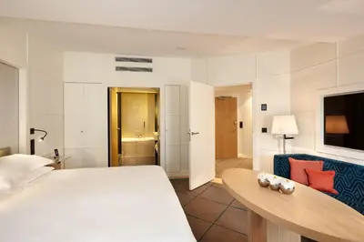 Un ou plusieurs lits dans un hébergement de l'établissement Hotel Opéra Richepanse