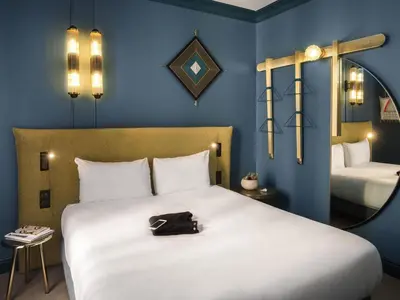 Un ou plusieurs lits dans un hébergement de l'établissement ibis Styles Paris Nation Cours de Vincennes