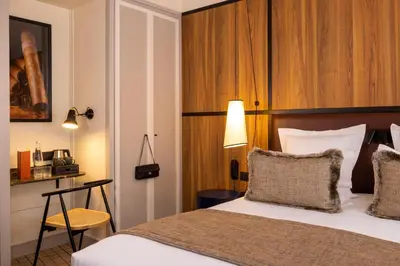 Un ou plusieurs lits dans un hébergement de l'établissement Hôtel Toujours & Spa