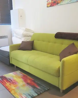 Coin salon dans l'établissement Mini Loft Daval