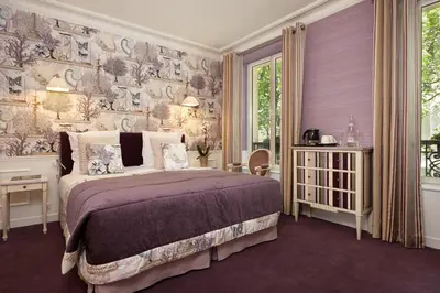 Un ou plusieurs lits dans un hébergement de l'établissement Hôtel Relais Saint Jacques Paris