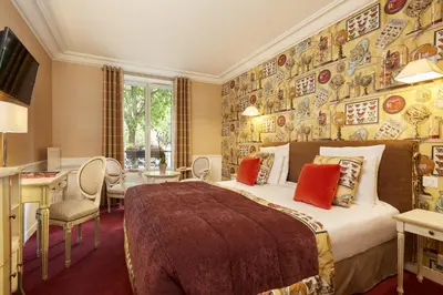 Un ou plusieurs lits dans un hébergement de l'établissement Hôtel Relais Saint Jacques Paris
