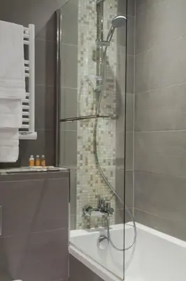 Salle de bains dans l'établissement Timhotel Opéra Blanche Fontaine
