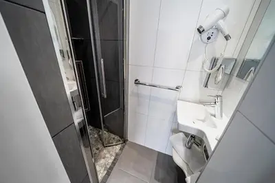 Salle de bains dans l'établissement Hotel de la Paix Tour Eiffel